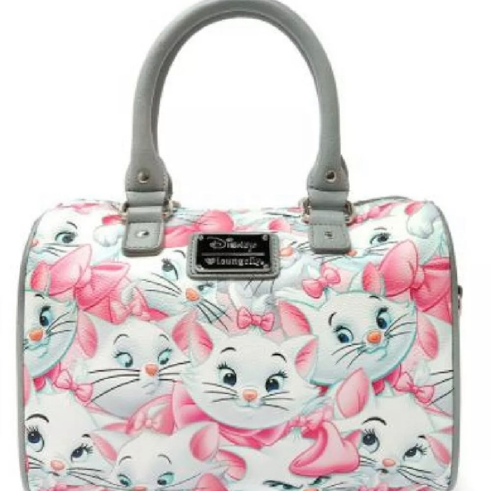 Limited Edition. Brand new Disney Marie Bowling bag purse with matching wallet